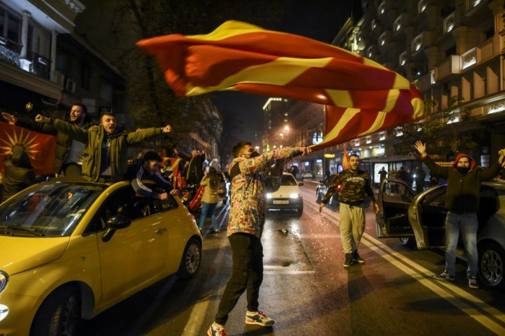 North Macedonia supporters poured into the streets of Skopje to celebrate after the Balkan nation qualified for the European football championships for the first time