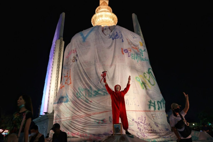 A crowd of several thousand turned out for a carnival themed rally dubbed 'Mob Fest' at the Democracy Monument
