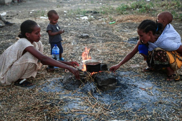 Thousands of Ethiopians have fled fighting in their home of Tigray into neighbouring Sudan, many with only what they could carry; this photograph was taken east of the town of Gadaref, on November 13