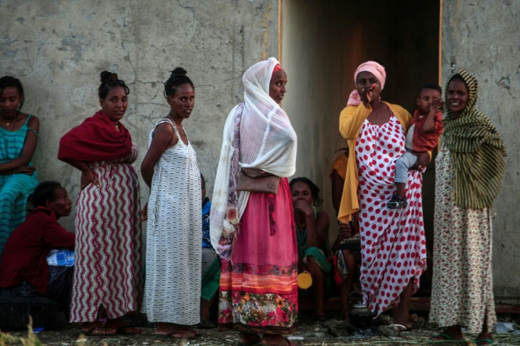The United Nations rights chief Michelle Bachelet has warned of possible war crimes in Ethiopia's Tigray; these women were photographed on November 13 having fled into neighbouring Sudan
