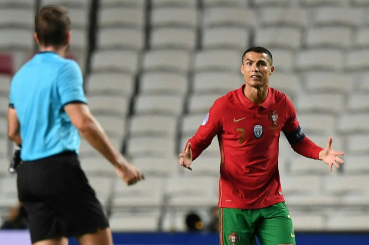 Hear and now! Cristiano Ronaldo talks to German referee Tobias Stieler