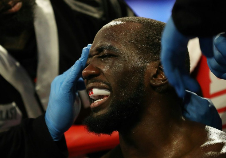 Unbeaten Terence Crawford, shown here in 2019, stopped England's Kell Brook in the fourth round to retain his WBO welterweight title and earn his eighth straight knockout victory