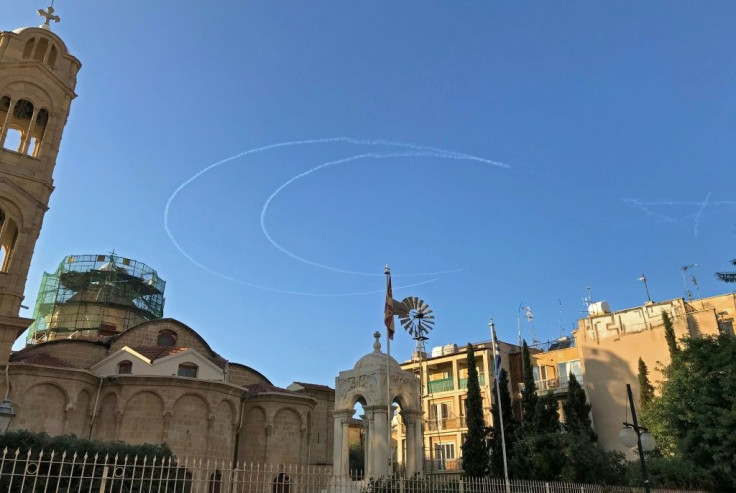 Turkish jets marked a star and crescent in the sky over Nicosia during Erdogan's visit to the self-proclaimed TRNC