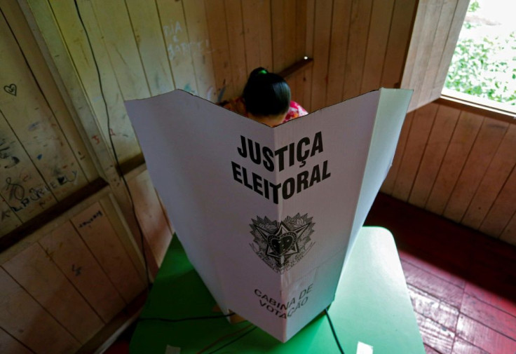 A woman votes in Brazil's municipal elections that saw several transgender candidates win seats