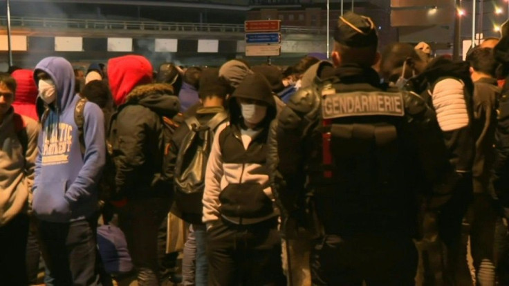 French police evacuate a big makeshift migrant camp in Saint-Denis