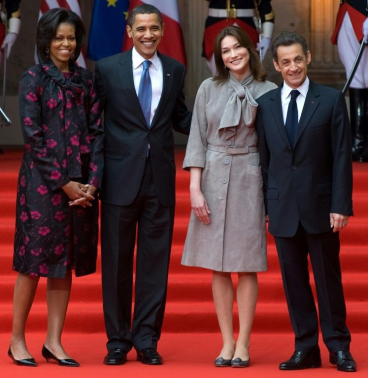 Former US president Barack Obama in a new memoir likens former French president Nicolas Sarkozy -- seen here at a 2009 summit with their wives, Michelle Obama and Carla Bruni-Sarkozy -- to a subject of a Toulouse-Lautrec painting