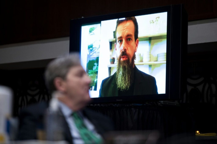 Jack Dorsey, Chief Executive Officer of Twitter, testifies remotely as Senator John Kennedy looks on during the Senate Judiciary Committee hearing on "Breaking the News: Censorship, Suppression, and the 2020 Election"