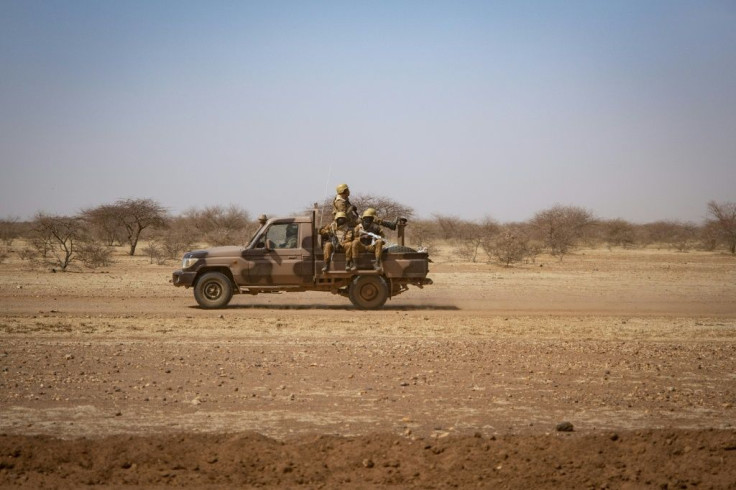 Soldiers on the road to the northern town of Dori -- Burkina Faso holds an election on Sunday but large areas remain outside the state's control