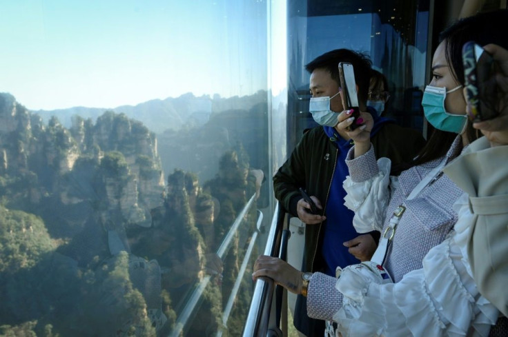 The three double-decker elevators in central China's Zhangjiajie Forest Park zip up the cliff in just 88 seconds