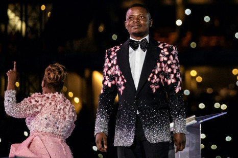 Arrested: Shepherd Bushiri, seen here on stage with his wife, Mary Bushiri, at a stadium in Soweto on New Year's Day