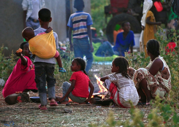 Ethiopian refugees who fled fighting in Tigray province at a reception centre  in eastern Sudan's Gedaref province