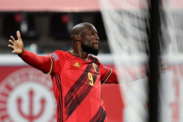 Romelu Lukaku scored twice as Belgium beat Denmark 4-2 to qualify for the Nations League finals