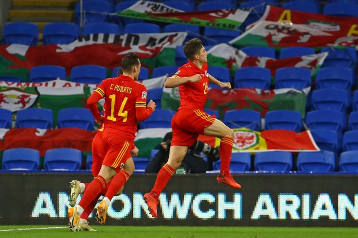 Daniel James celebrates after scoring for Wales as they beat Finland 3-1 to secure promotion to the top tier of the Nations League