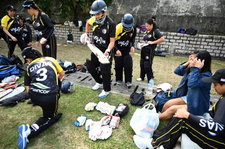 "They're so passionate about it. They all come here and they all watch and they make a day of it": Hard-working Filipino domestic helpers use their one day off a week in Hong Kong to play cricket