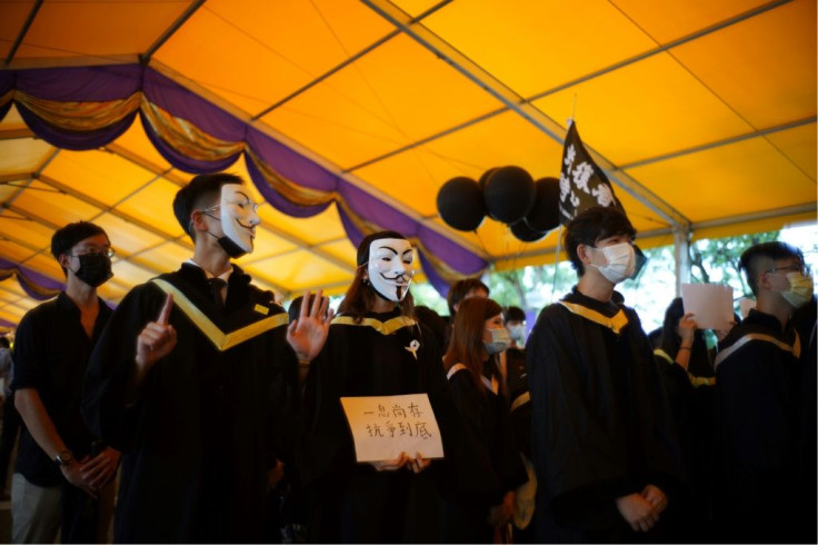 The Chinese University of Hong Kong (CUHK) students donned face masks to display outlawed slogans and defy the new national security law imposed by Beijing