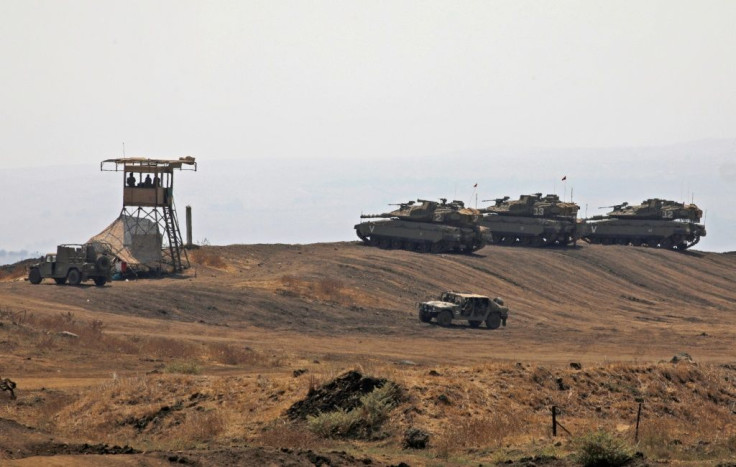 Israeli tanks take part in a military drill in the Israeli-annexed Golan Heights on September 1