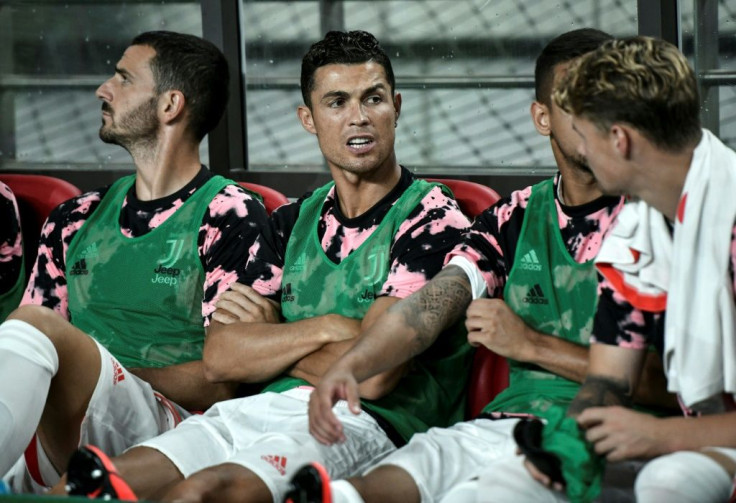 Cristiano Ronaldo (C) stayed on the bench during the exhibition match in Seoul last year