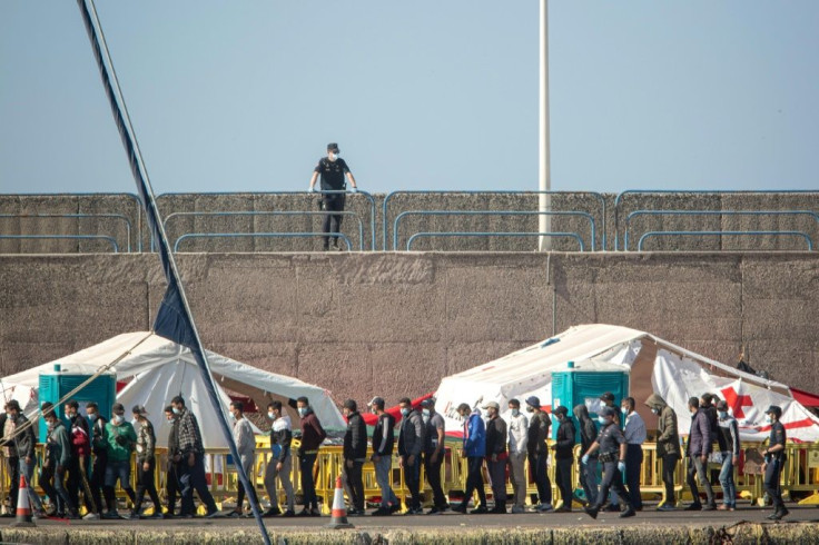 The Arguineguin port camp was put up to process arrivals and run virus tests but it has become saturated with more than 2,000 migrants sleeping there