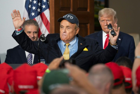 Giuliani, shown with President Donald Trump at his golf club in Bedminster, New Jersey on August 14, 2020 is said to have seen his relationship with the reality-star-turned-leader-of-the-free-world as a ticket to power