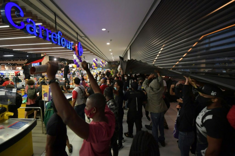 Demonstrators storm a Carrefour supermarket in Sao Paulo, Brazil, on November 20, 2020