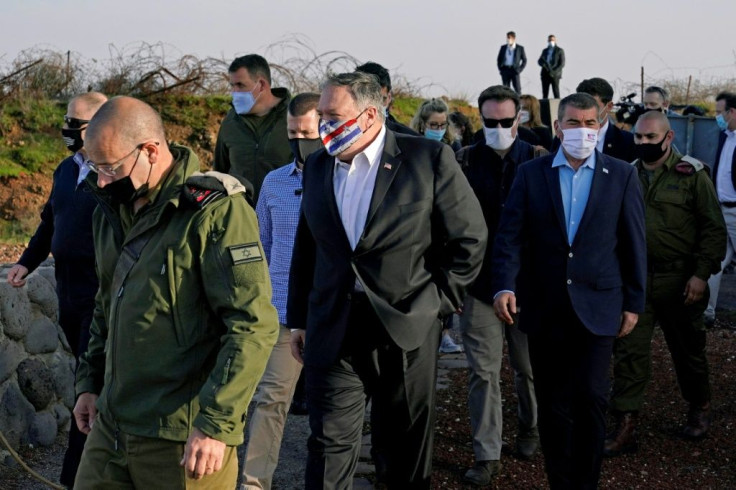 US Secretary of State Mike Pompeo and Israeli Foreign Minister Gabi Ashkenazi arrive for a security briefing in the Israeli-annexed Golan Heights, in a first visit by a top US diplomat, on November 19, 2020