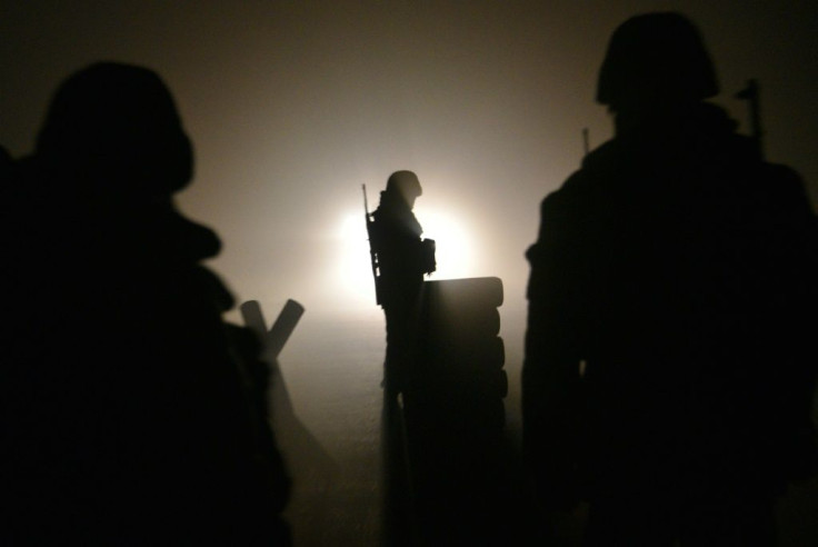 Armenian soldiers patroled a check point outside Aghdam before the district was due to be returned to Azerbaijan