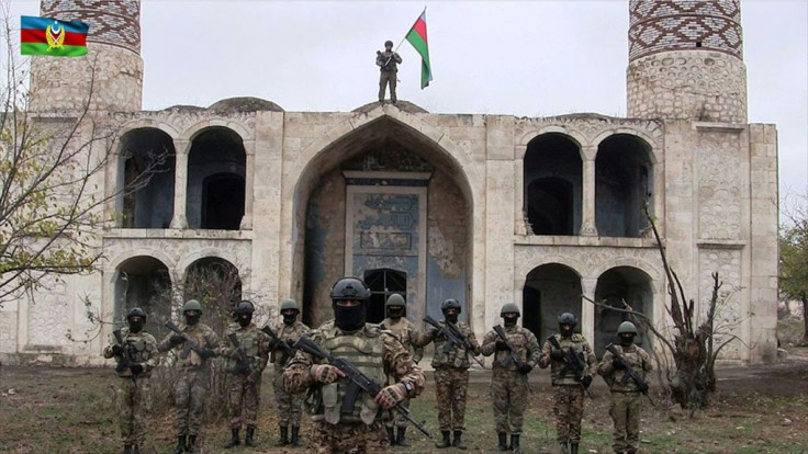 Azerbaijani troops Friday moved into the Aghdam district bordering Nagorno-Karabakh