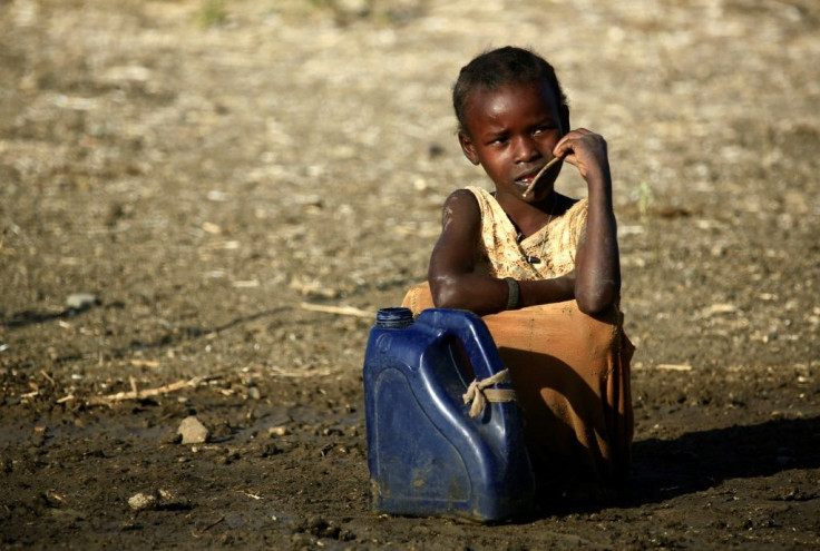 An Ethiopian girl who fled fighting in Tigray sits at a refugee transit centre in Sudan; fighting in Tigray has left some 2.3 million children in urgent need of assistance and thousands more at risk in refugee camps, the UN children's agency says