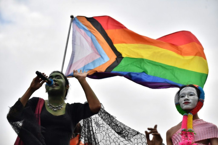 Siraphob Attohi (L) calls for gender equality during Thailand's protests for democratic reforms in his drag persona Masala Bold