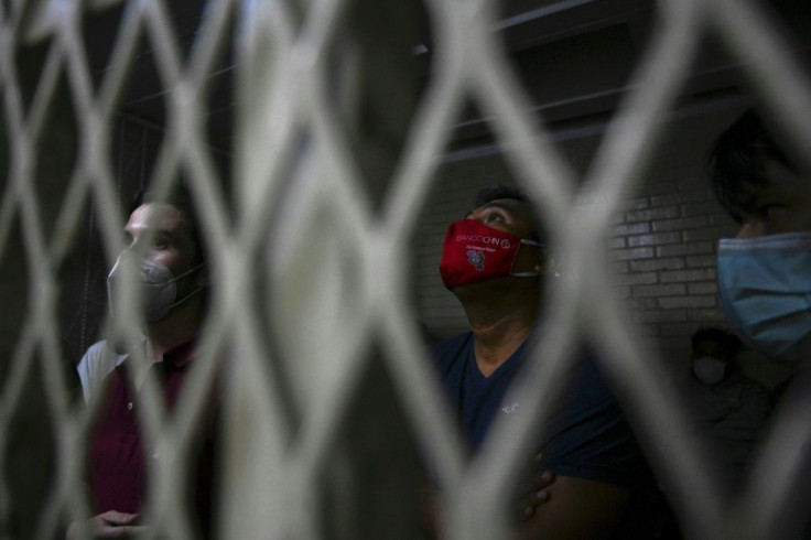 People who were detained during a protest demanding the resignation of Guatemalan President Alejandro Giammattei, pictured in a cell in Guatemala City, November 2020