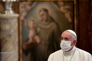 Pope Francis, pictured October 2020 wearing a protective face mask, railed against people who claim "that being forced to wear a mask is an unwarranted imposition by the state"