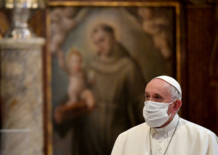 Pope Francis, pictured October 2020 wearing a protective face mask, railed against people who claim "that being forced to wear a mask is an unwarranted imposition by the state"