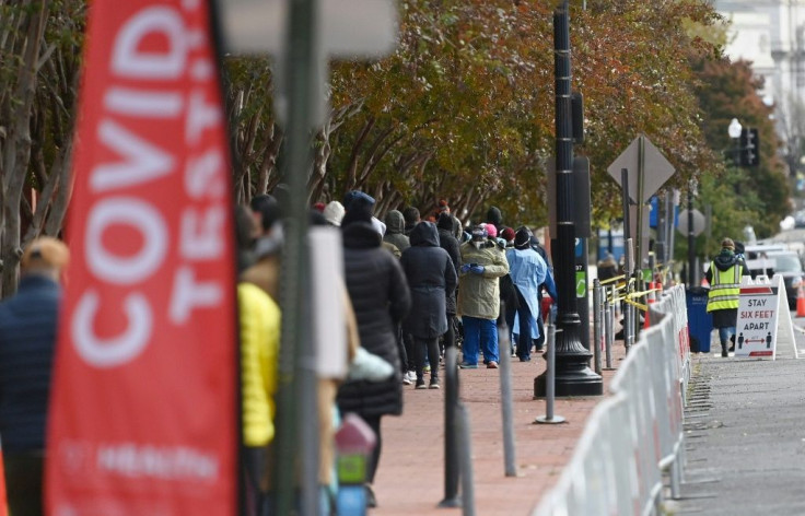 Many Americans are queuing to get coronavirus tests before traveling home for Thanksgiving