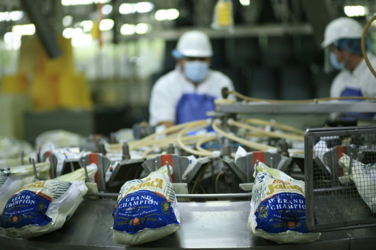 Workers pack turkeys at Jaindl Farms in Orenfield, Pennsylvania, on 20 November 2020