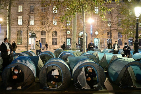 Volunteers had helped set up around 500 blue tents at the Place de la Republique in the heart of the French capital late Monday