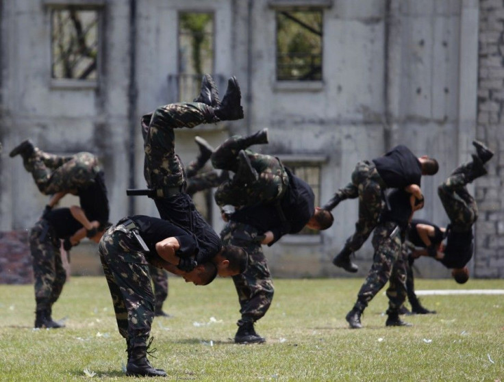 People's Liberation Army soldiers demonstrate martial arts during an open day of their barracks in Hong Kong