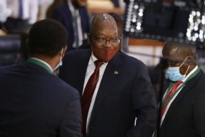 Jacob Zuma, centre, faced an anti-graft panel over the widespread looting of state assets during his presidency