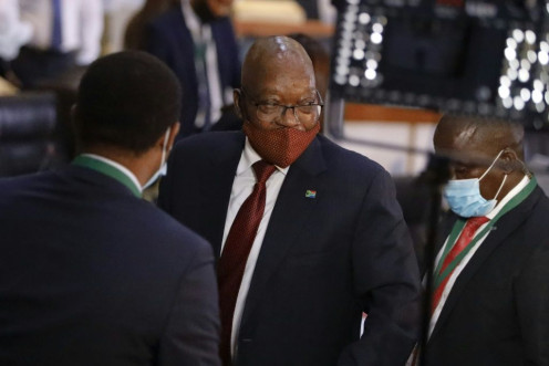 Jacob Zuma, centre, faced an anti-graft panel over the widespread looting of state assets during his presidency