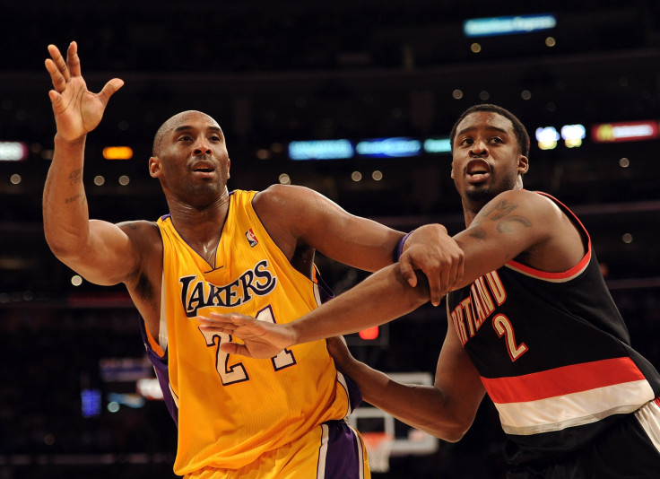Kobe Bryant #24 of the Los Angeles Lakers calls for an inbound pass in front of Wesley Matthews #2 of the Portland Trail Blazers