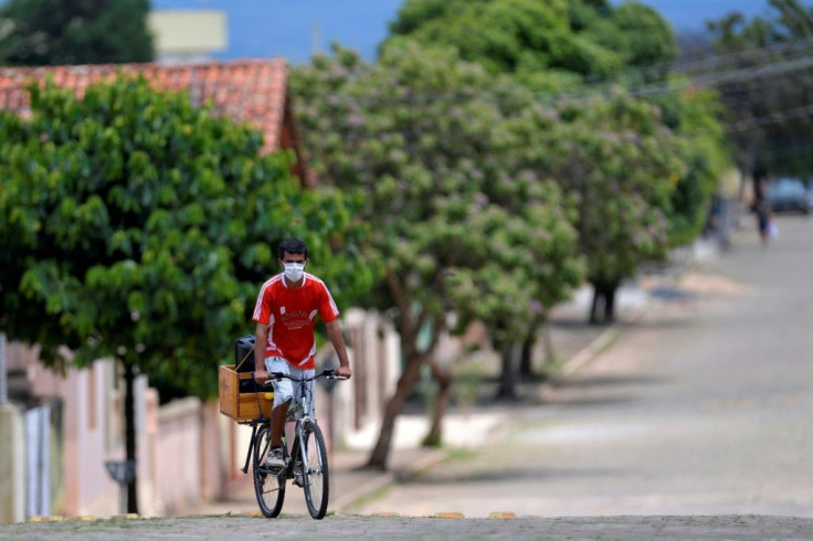 Flavio Rafeal rides through the town of Cedro do Abaete, the only Brazilian town without a case of Covid-19, blaring a message via loudspeakers that reminds residents to stay vigilant against the virus