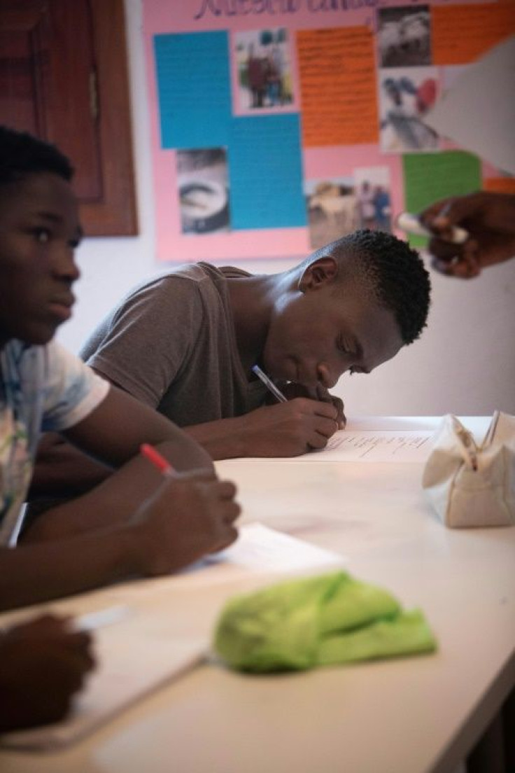 Newly arrived migrants attend a Spanish language class in one of the reception centres mon Gran Canaria