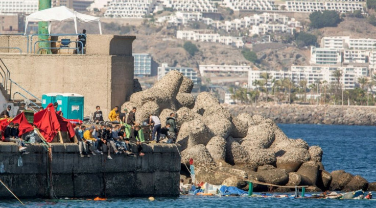 Rescued migrants arrive in the Gran Canaria port of Arguineguin a few days ago. The migrant surge and the coronavirus pandemic have kept the tourists away from the archipelago