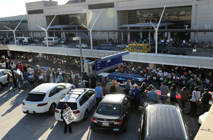 Protesters gather at the Los Angeles International Airport in January 2017 after US President Donald Trump restricts visits by citizens of several Muslim-majority nations