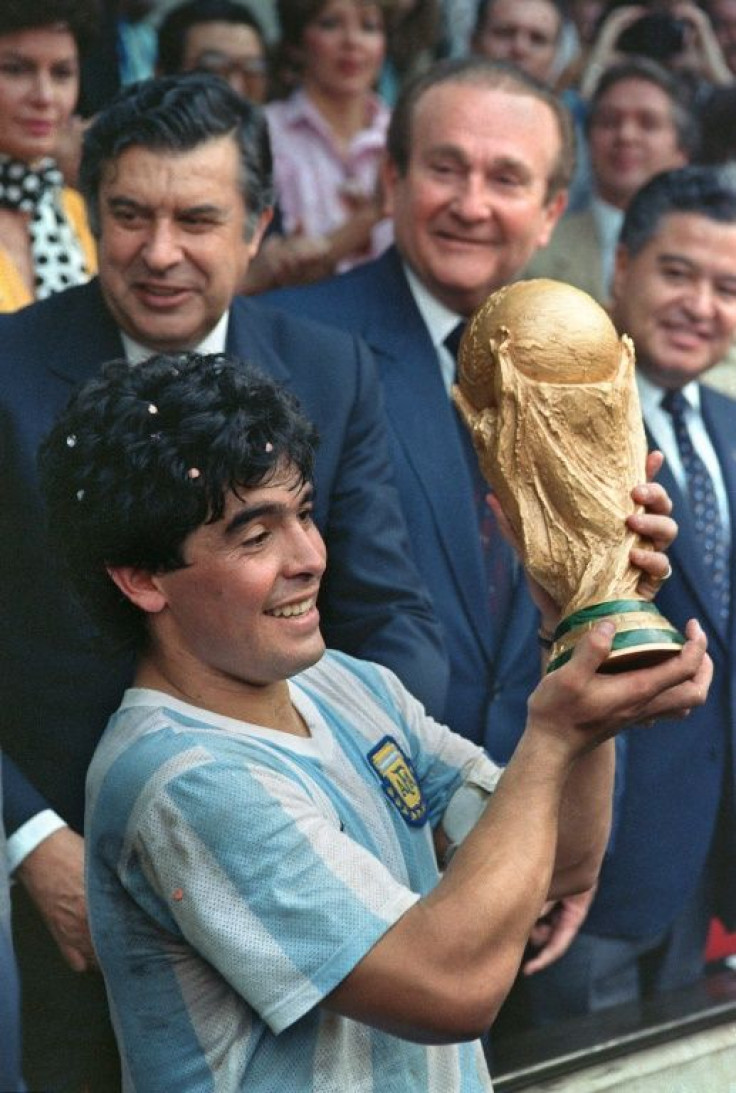 Diego Maradona holds aloft the World Cup after leading Argentina to glory in 1986 in a tournament that featured his infamous "Hand of God" goal
