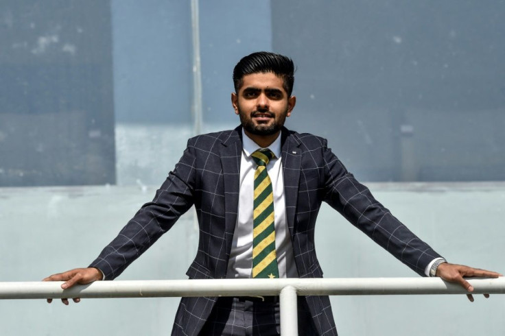 Pakistan captain Babar Azam posing for photographers in Lahore on November 20 before the squad left for New Zealand