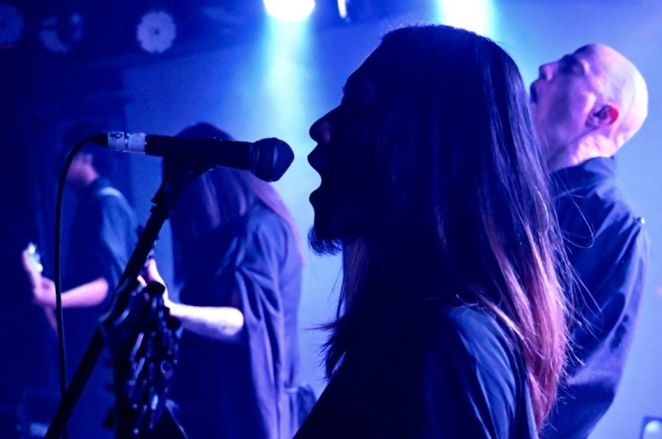 Taiwanese death metal band Dharma dress in black robes and use traditional Sanskrit sutras as lyrics