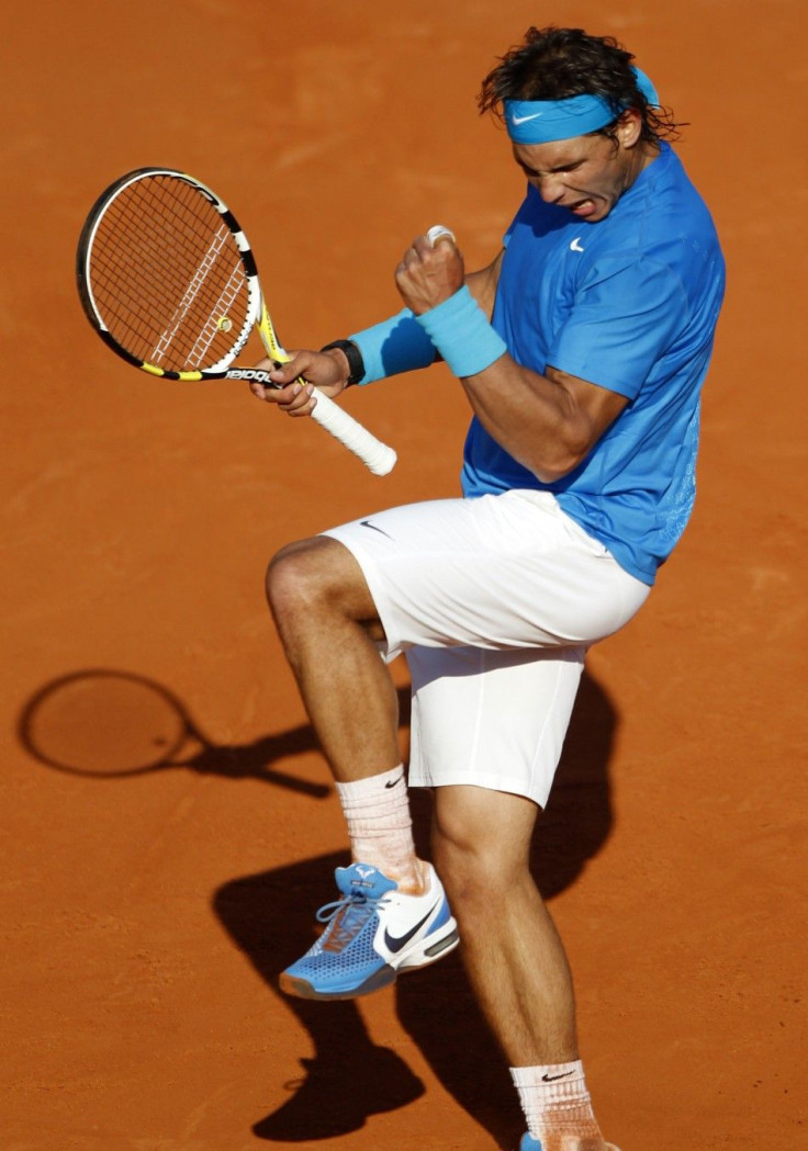 Nadal of Spain reacts after defeated Soderling of Sweden during their quarter-final match at the French Open tennis tournament at the Roland Garros stadium in Paris.