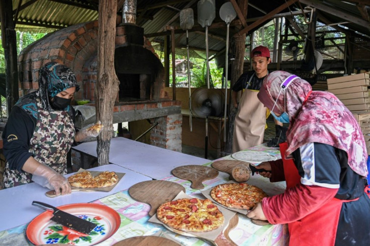 A Malaysia family opened a pizzeria in their backyard to combat their economic woes during the pandemic
