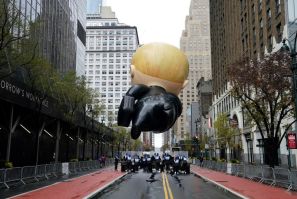 The "Boss Baby" balloon floats during an uncharacteristically subdued Macy's Thanksgiving Day Parade in New York on November 26, 2020