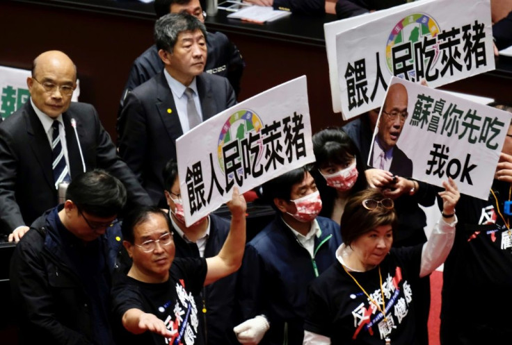 Legislators from Taiwan's KMT on Friday protested the government's decision to ease restrictions onÂ pork imports from the US